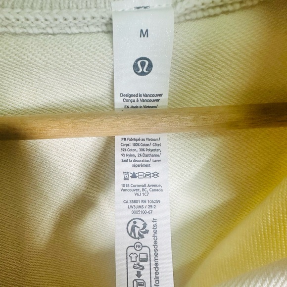 lululemon athletica Cropped Cream Varsity Jacket with Striped Trim - Picture 4 of 5